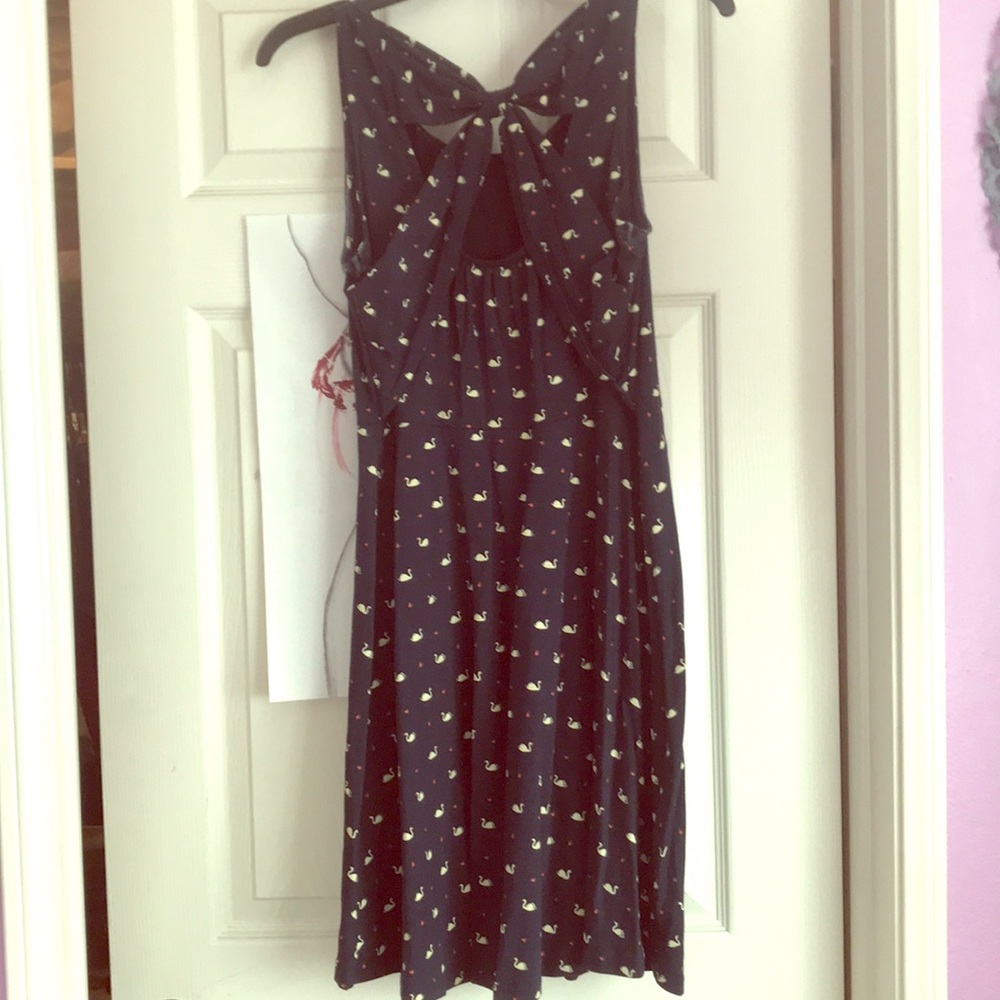 Navy blue dress with detailed back and swan print